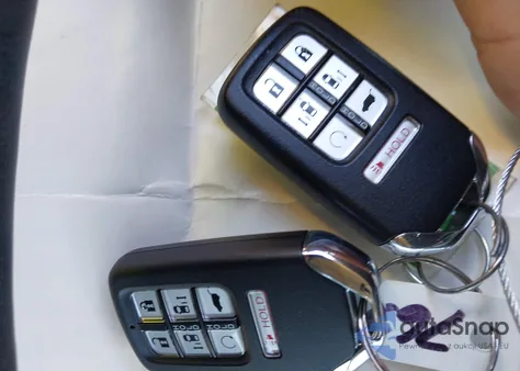 2023 Honda Odyssey Elite z USA, uszkodzony, nr VIN 5FNRL6H97PB017653